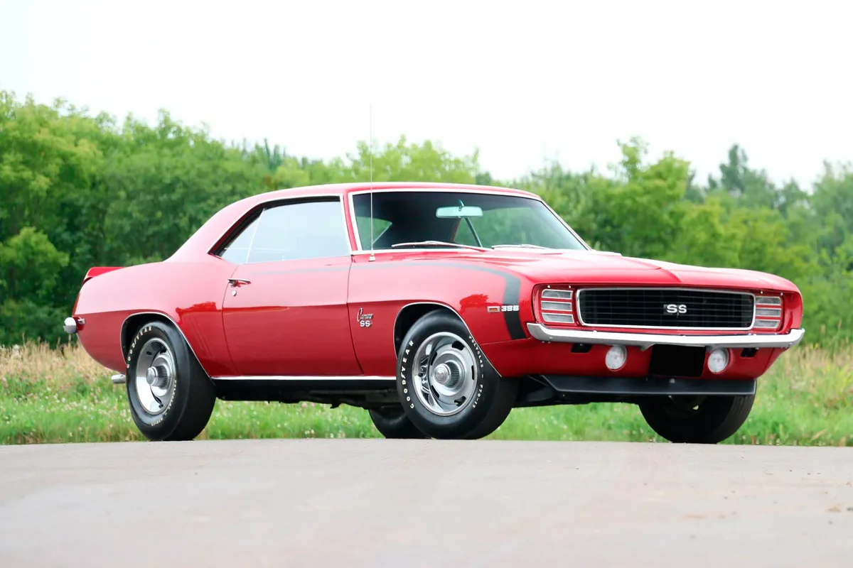 Red 1969 Chevrolet Camaro SS shown completely from a front three-quarter angle